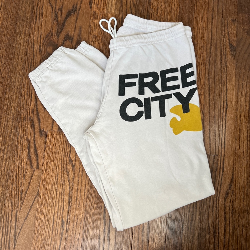 Free City Women’s sweatpants size 2/M in beige and mustard yellow logo